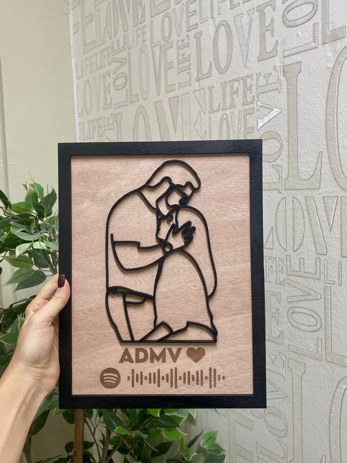 Cuadro de pareja con canción de Spotify